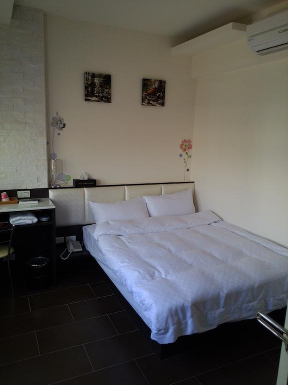 Tilon Hotel Pingtung Zimmer foto